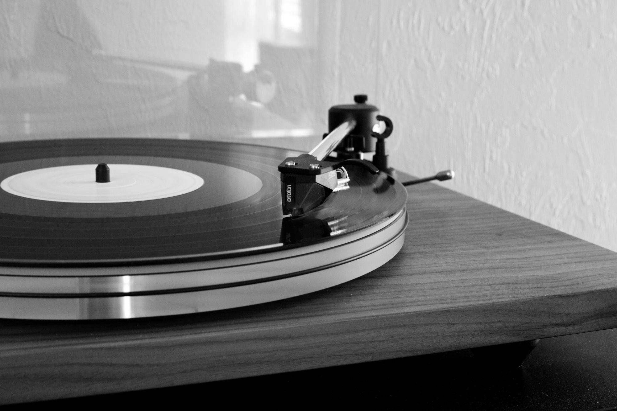 Turntable with spinning vinyl record on it